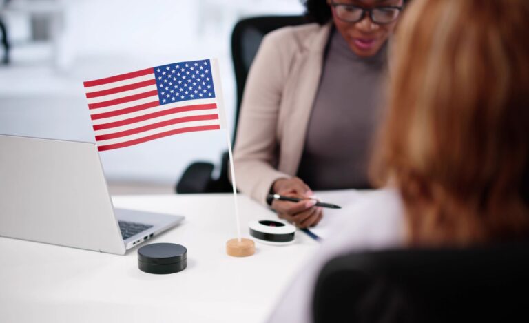 An immigration lawyer consulting a woman who wants to apply for permanent residency
