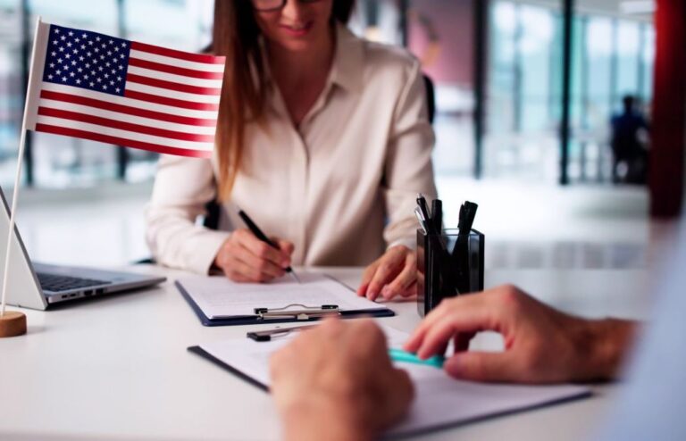 US immigration visa applicant filling out documents at U.S. consulate