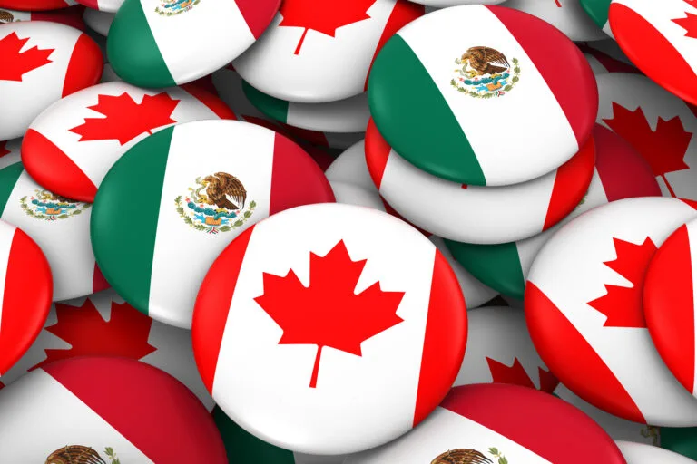 Canada and Mexico Badges Background - Pile of Canadian and Mexican Flag Buttons 3D Illustration
